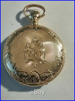 Elgin 0S. Near Mint (1905) fancy dial 7 jewels 14K. Solid Gold hunter case