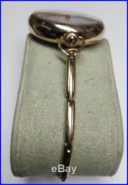 Elgin 0s. Great fancy dial 7 jewels near mint gold filled case restored