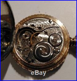 Elgin 0s. Mint fancy dial 15 jewels near mint multi-color silver case restored