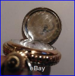 Elgin 0s. Mint fancy dial 15 jewels near mint multi-color silver case restored