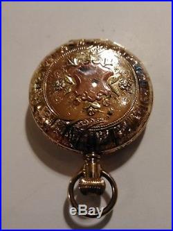Elgin 6s. Mint fancy dial 7 jewels mint multi-color gold filled case restored