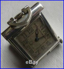 Fine Pocket watch 36 mm. X 30 mm. Aside close load manual nickel chromiun case