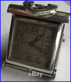 Fine Pocket watch 36 mm. X 30 mm. Aside close load manual nickel chromiun case