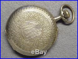 Goliath Roskopf pocket watch for repair, 67.25 mm case with hunting scene