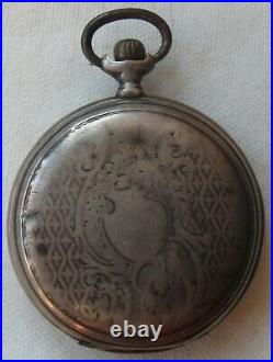 Longines pocket watch silver carved hunter case enamel dial 50 mm. In diameter