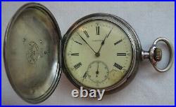 Longines pocket watch silver carved hunter case enamel dial 52 mm. In diameter