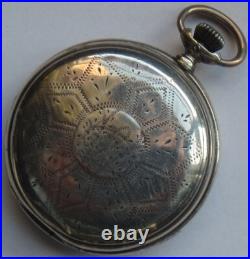 Longines pocket watch silver hunter carved case black enamel dial balance Ok