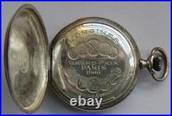 Longines pocket watch silver hunter carved case black enamel dial balance Ok