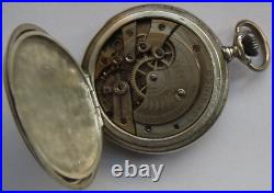 Longines pocket watch silver hunter carved case black enamel dial balance Ok