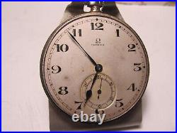 Omega. 900 Silver cased 12 size working pocket watch/runs&keeps reasonable time