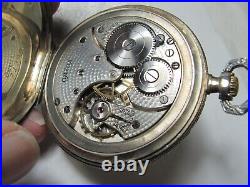Omega. 900 Silver cased 12 size working pocket watch/runs&keeps reasonable time