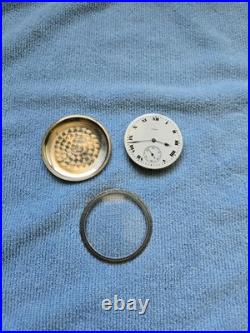Pocket watch movement with the case back and bezel