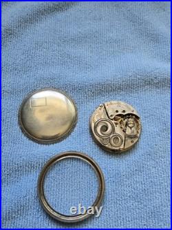 Pocket watch movement with the case back and bezel