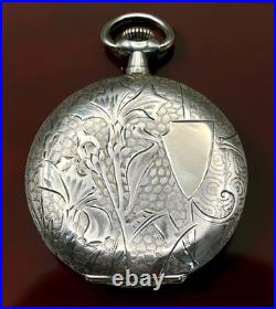 TITAN Swiss Pocket Watch Solid Silver 0.800 15 Jewels Floral Engraved Case