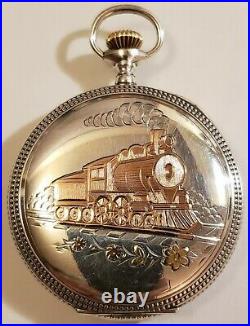 Waltham 12S. Royal 17 jewels adjusted Sterling with gold locomotive hunter case